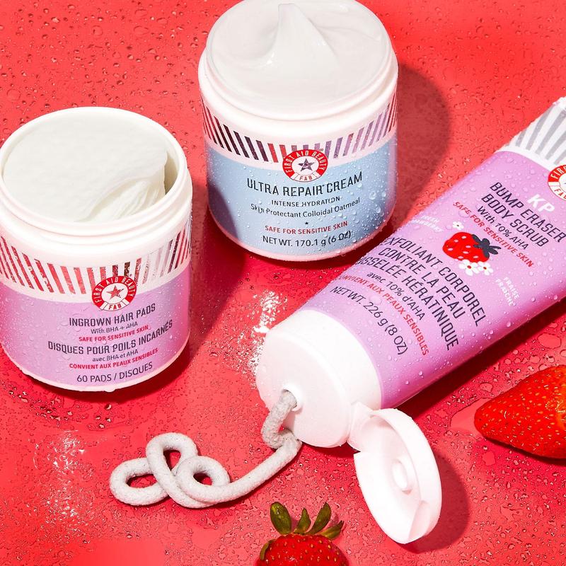 First Aid Beauty - KP Bump Eraser Body Scrub with 10% AHA, Keratosis Pilaris Exfoliating Skin Cleanser with 10% Lactic Acids Glycolic, Pumice & Bisabolol, Reduces Bumps, Strawberry Scent, 2 oz Body Care Smooth